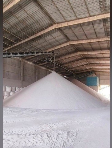 Covered warehouse storage of processed mineral sand