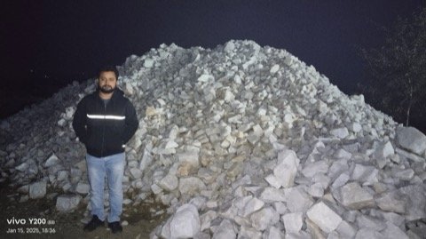 Sourcing team verifying feldspar quality at mine head