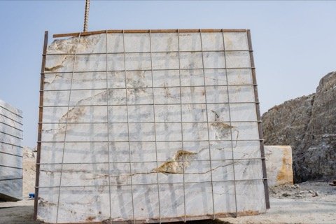 Slab yard with dressed material on racks