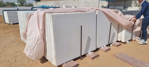 Packed slabs prepared for container stuffing